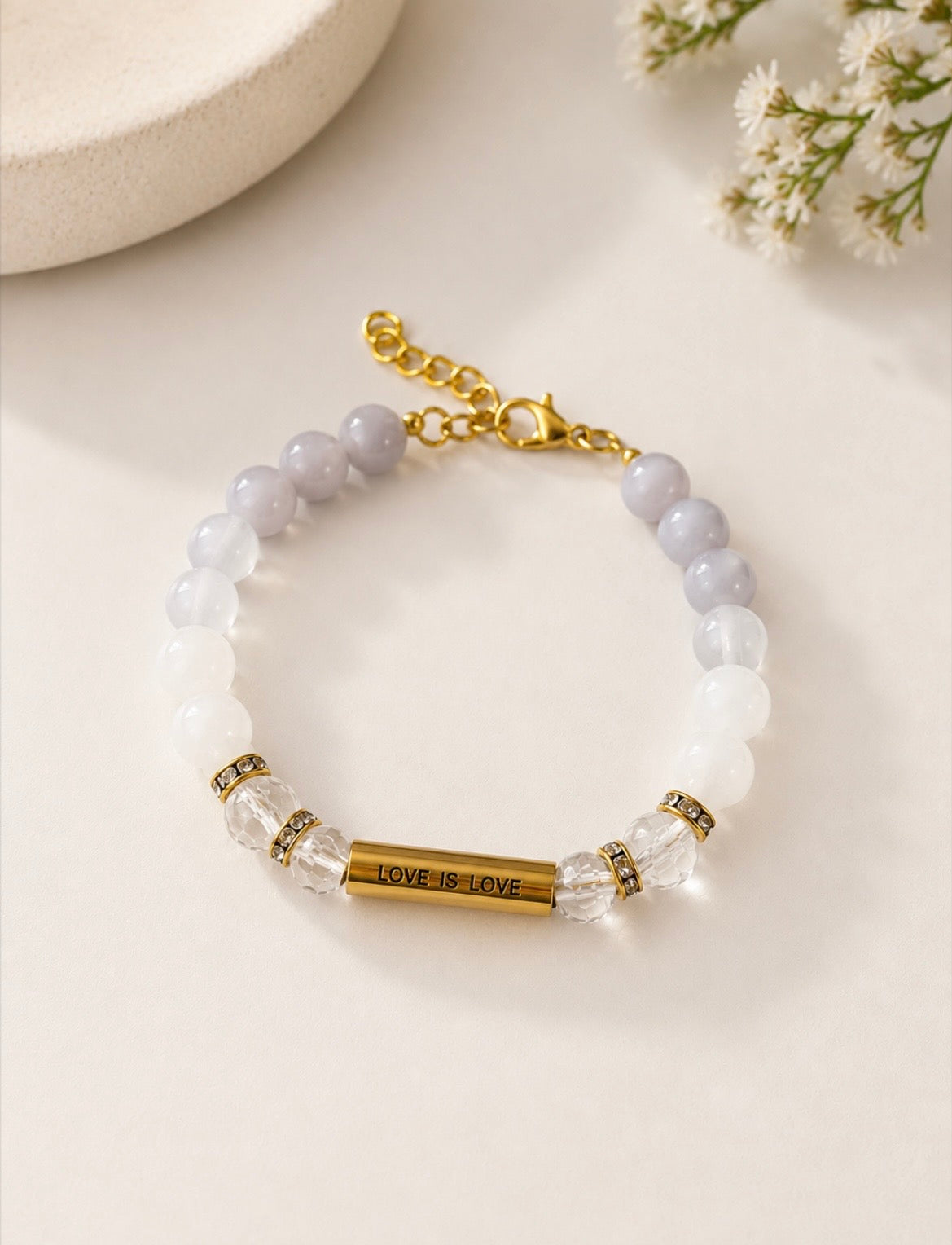 Love Is Love Bracelet with gold-engraved bar and milky white crystal beads — LOUD SOULS