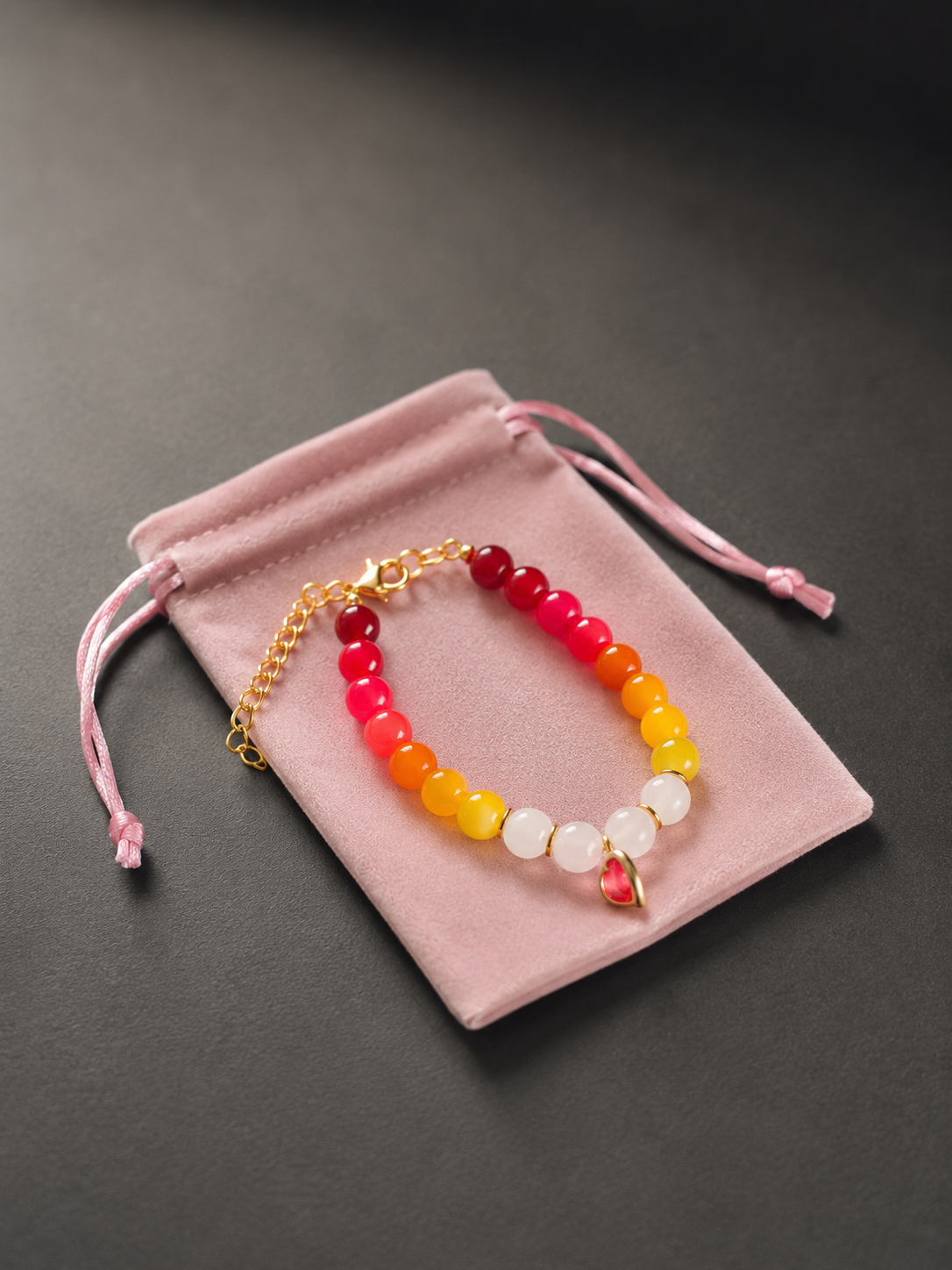 Sunset Heart Bracelet presented in a pink velvet gift pouch — LOUD SOULS jewelry packaging