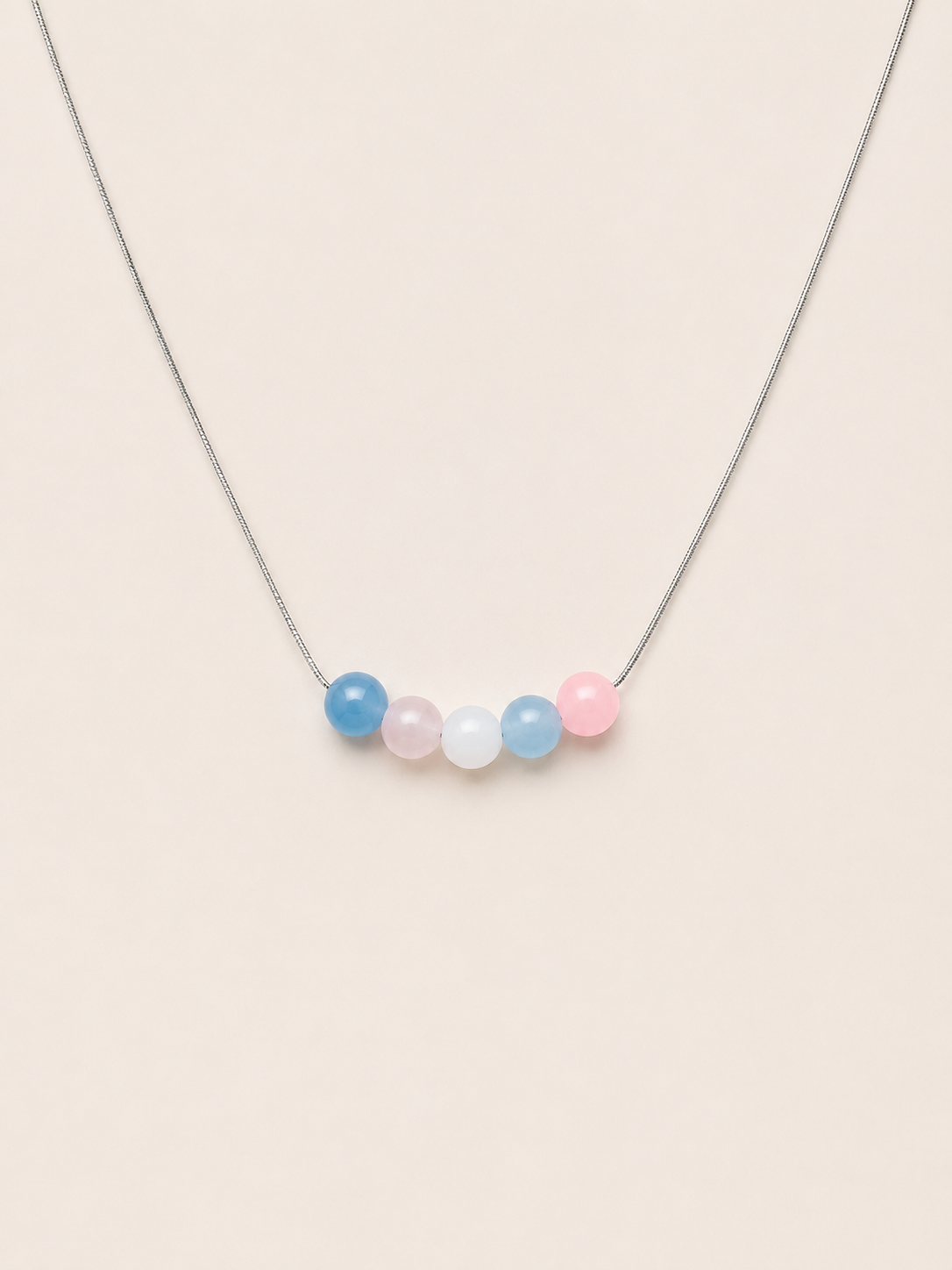The Alignment Trans Pride Necklace with pastel blue, pink and white beads on a fine silver chain — LOUD SOULS